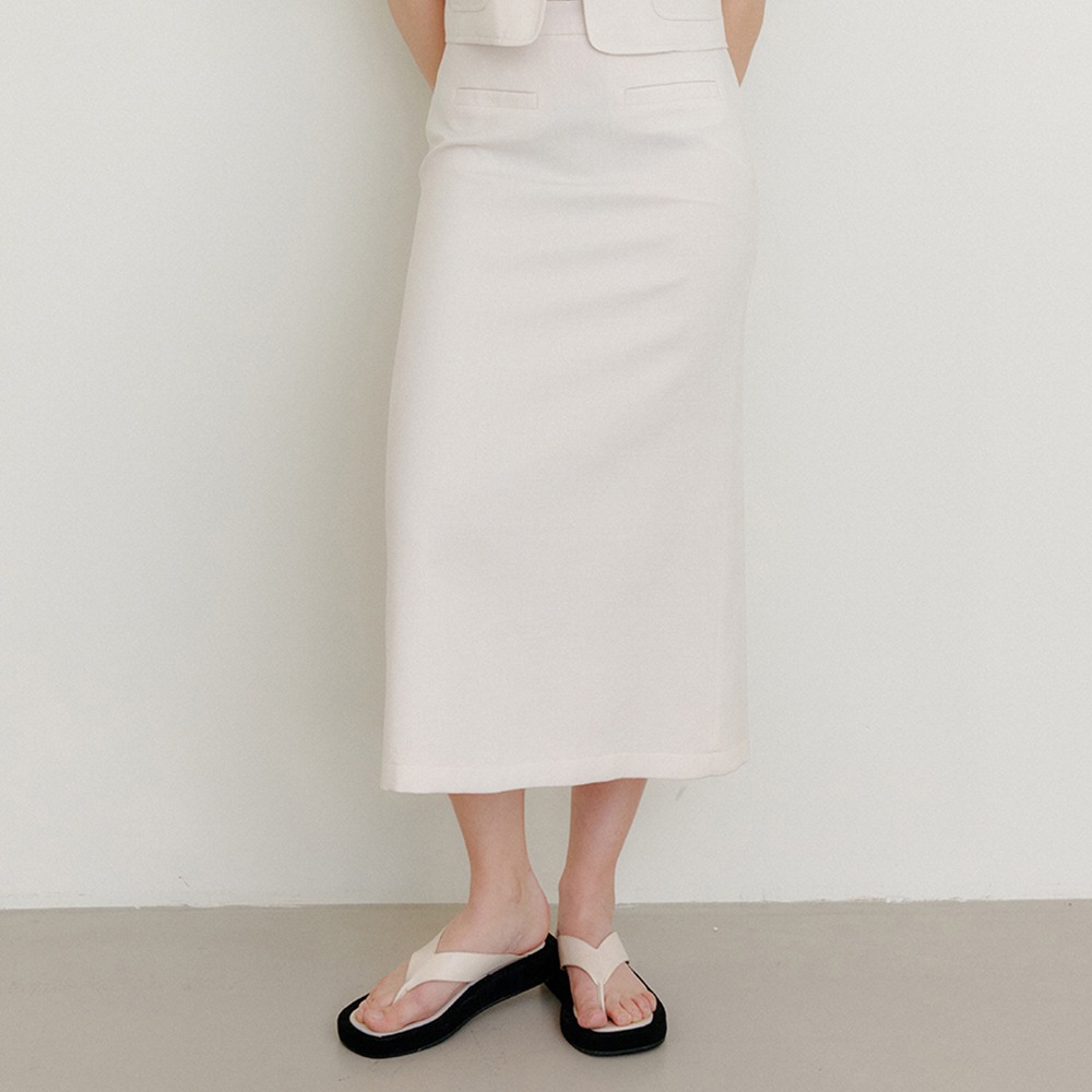 셀리아 버튼 포인트 미디 스커트_크림 / CELLIA BUTTON POINT MIDI SKIRT_CREAM