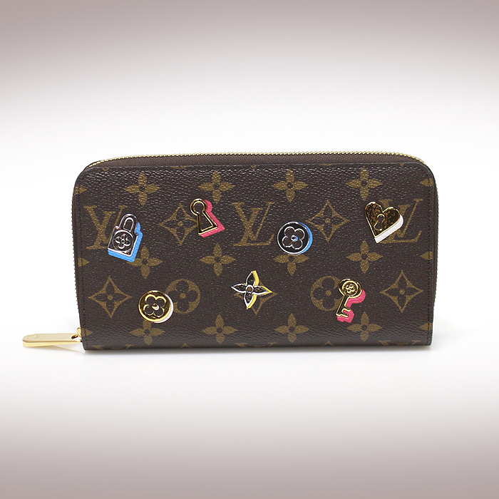 Louis Vuitton(루이비통) M64116 스페셜 에디션 모노그램 캔버스 LV 러브 락 지피 월릿 장지갑
