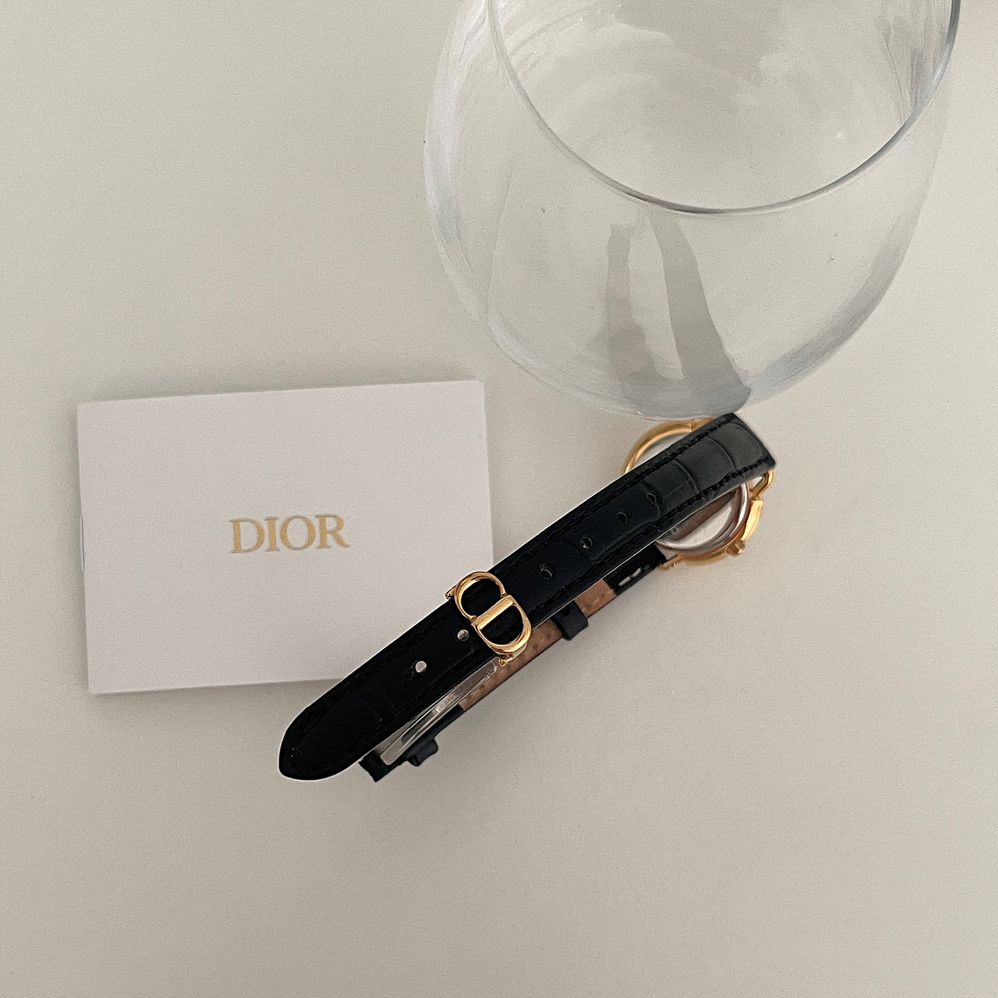 CHRISTIAN DIOR shell dial gold watch with CD buckle