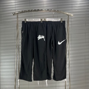 나이키 x 스투시 윈드러너 팬츠 오프느와르
