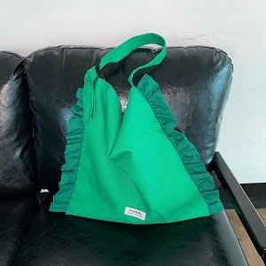 Com9uRe.ORGN Side Frill Bag