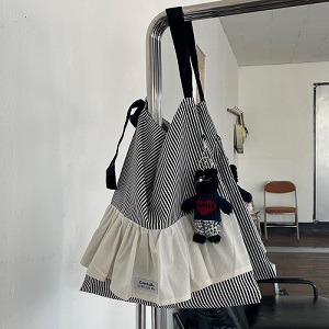 Com9uRe.ORGN Stripe Frill Bag