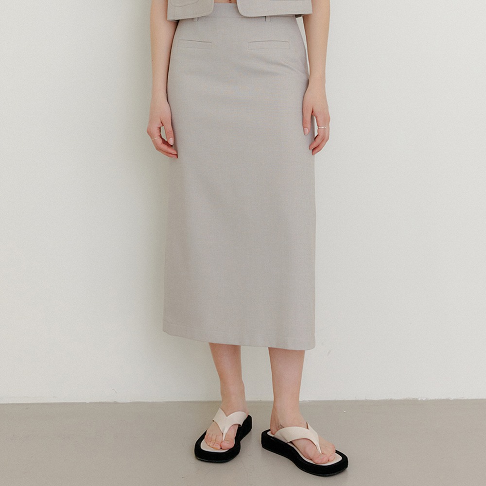 셀리아 버튼 포인트 미디 스커트_베이지 / CELLIA BUTTON POINT MIDI SKIRT_BEIGE