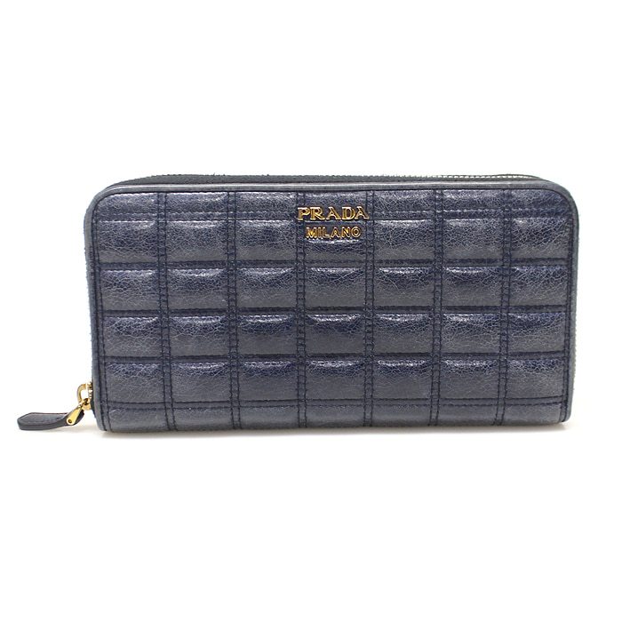 Prada(프라다) 1M0506 네이비 비텔로 샤인 퀄팅 금장 로고 짚 어라운드 장지갑