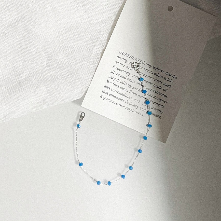 BLUE TEXT BRACELET