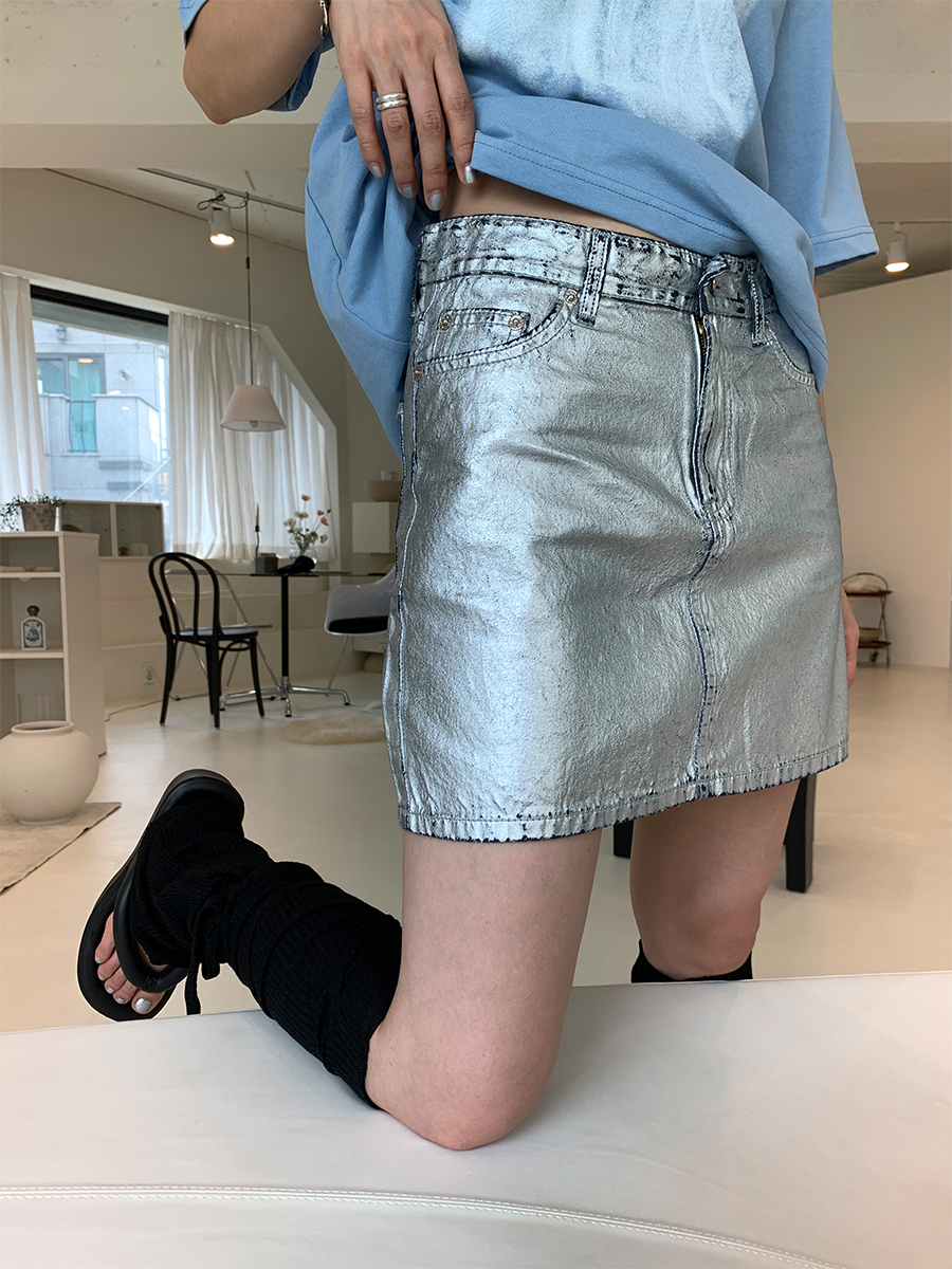 Silver at skirt