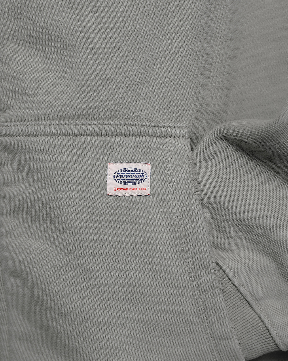 [PARAGRAPH]★25SS★韓国大人気★PARAGRAPH CROSS HOODIE DESTROYED CROSS ZIP HOODIE-GRAY - paragraph