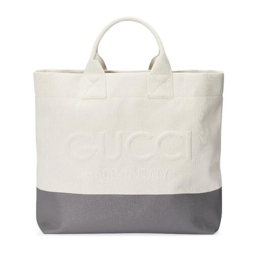 구찌 여성 토트백 GUCCI 엠보싱 디테일의 캔버스 토트백 779510FAC4V8473