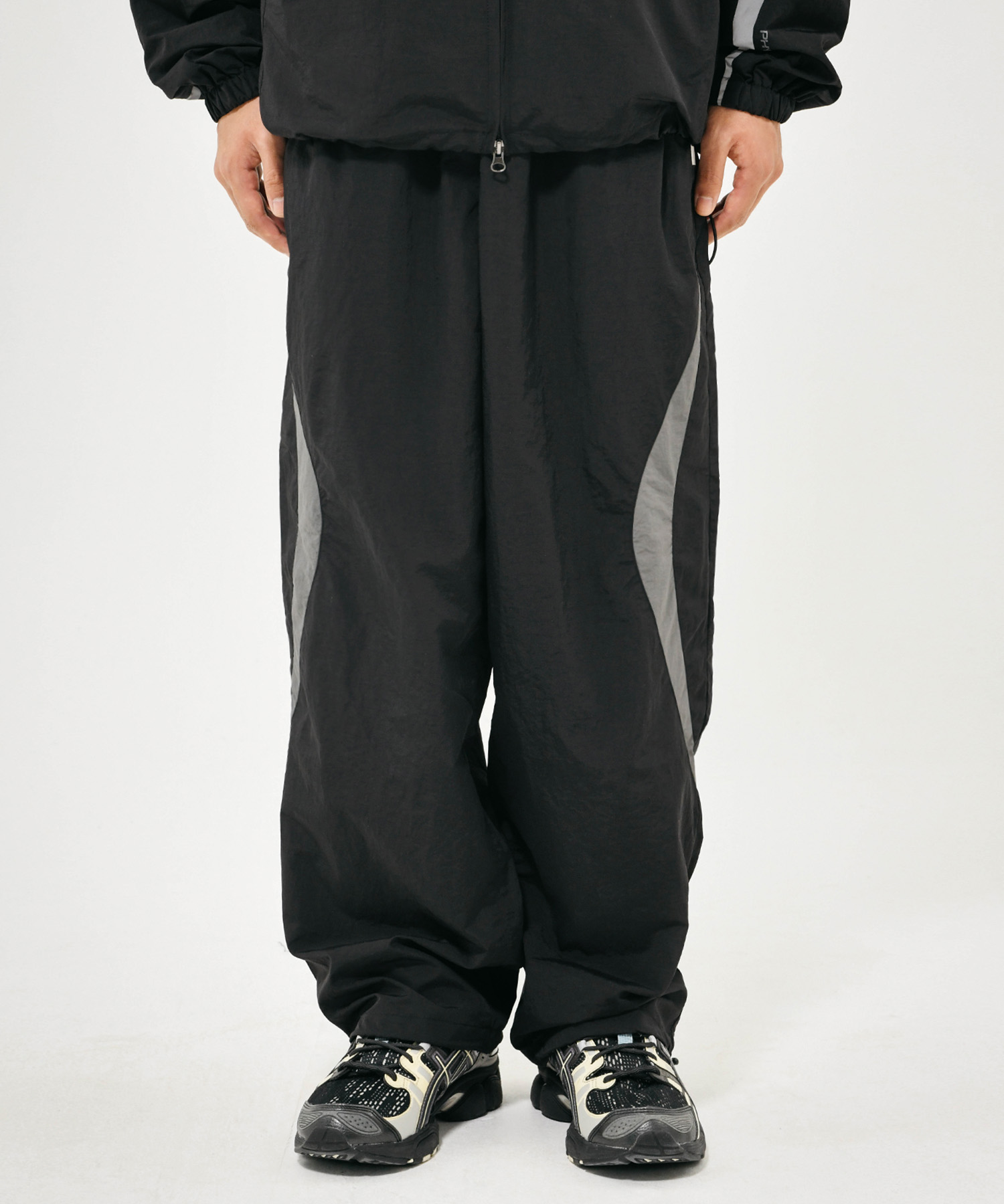 CURVE PIPING TRACK PANTS BLACK