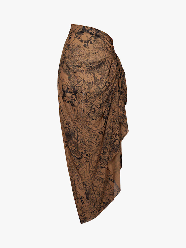 BROWN GRAPHIC PRINTED ASYMMETRIC SKIRT  산쿠안즈 브라운 그래픽 프린트 비대칭 스커트 - 아데쿠베