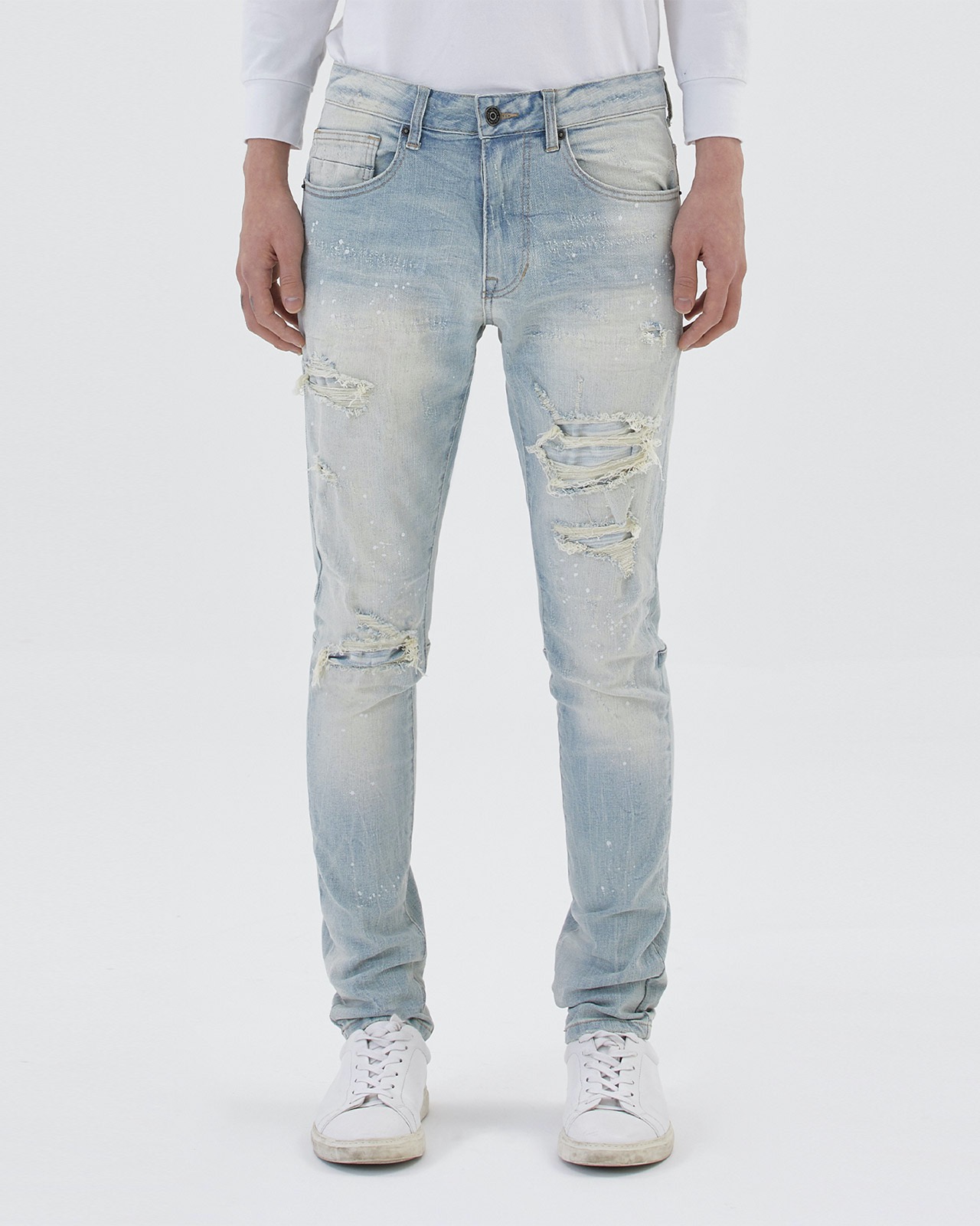 DISTRESSED RIP AND REPAIR JEANS